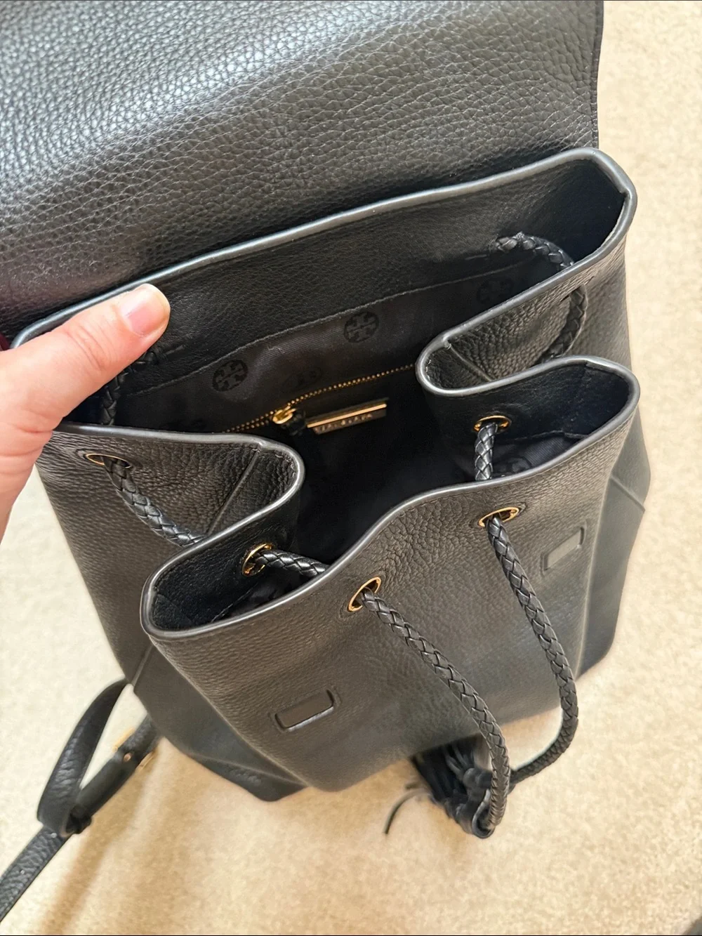 Tory Burch Black Pebbled Leather Tassel Flap Backpack